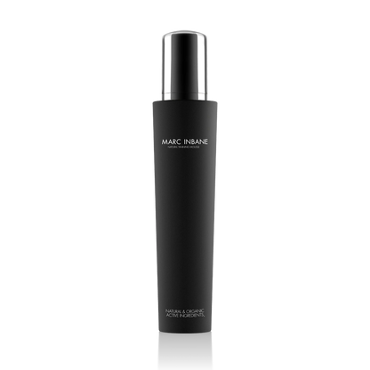 Produktbild av Marc Inbane Natural Tanning Mousse i svart flaska med silverdetalj, brun utan sol med naturliga och organiska ingredienser.
